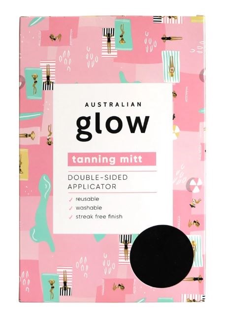 A pink box with colorful images of bees, stripes, and abstract shapes, containing Australian glow tanning mitt with applicator.
