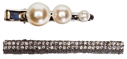Two pearl hair clips and a strip of small sparkling stones. The pearls are large and white. The stones are tiny and shiny.