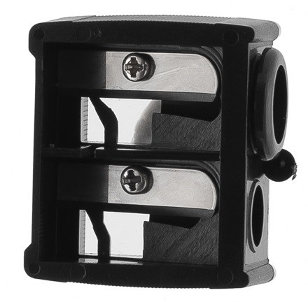 A black and silver electrical wall socket with two round holes for plugs.