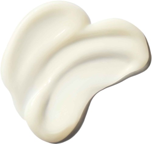 Ein weißer, glatter, klumpartiger Stoff, möglicherweise Creme oder Lotion, mit gewölbter, glänzender Oberfläche.