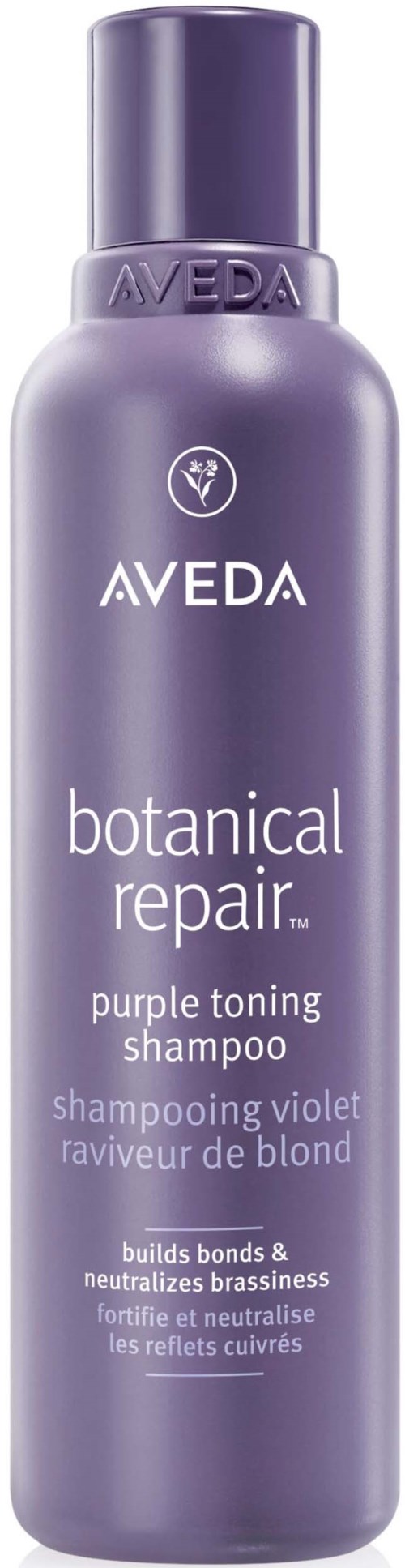 Eine lila Flasche Aveda botanical repair lila Tönungsshampoo mit Text und einfachem Etikett.