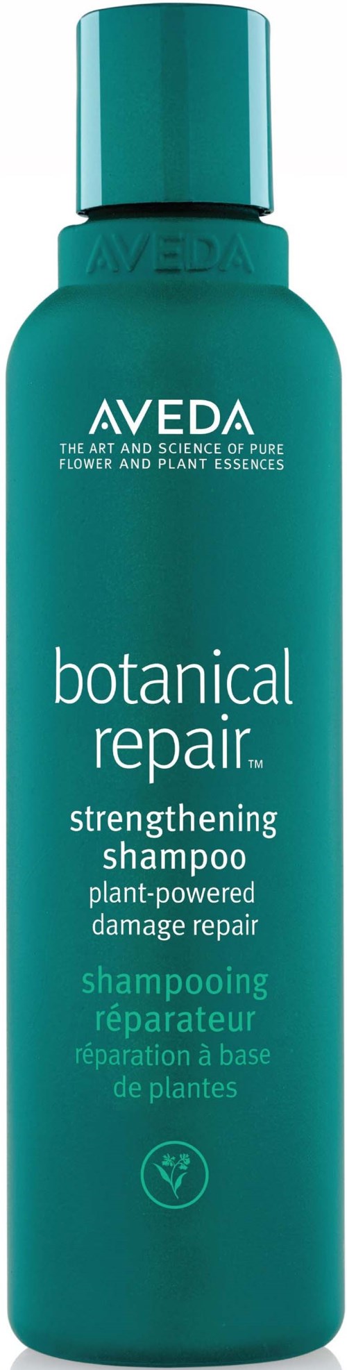 Eine türkisfarbene Flasche von Aveda Botanical Repair stärkendes Shampoo für geschädigtes, pflanzenbasiertes Haar.