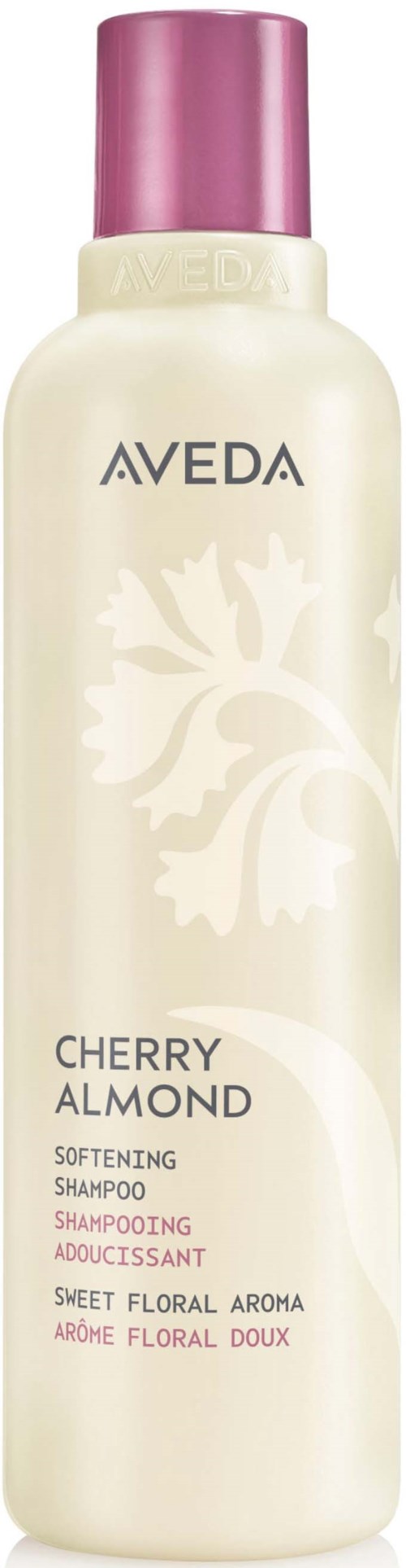 Eine Flasche Aveda Cherry Almond pflegendes Shampoo mit rosa Kappe und Blumenmuster auf dem Etikett.