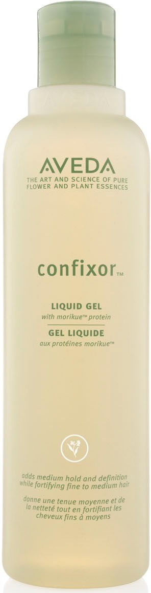 Eine AAVEDA confixor Liquid Gel-Flasche, weiß mit grünem Verschluss, hat grüne und schwarze Schrift und ein Logo.
