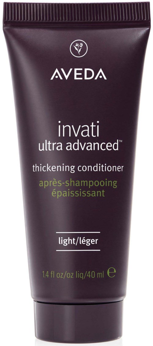 Dunkelvioleter Tube von Aveda Invati verdickende Spülung, 14 Unzen, für helles Haar, mit grünem und weißem Text.