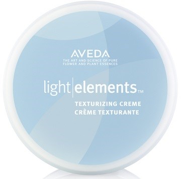 Ein runder Behälter mit Aveda Light Elements-Text und Beschreibung einer Texturierungssahne.