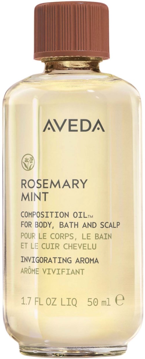 En klar flaske med brun lokk som inneholder Aveda rosmarin-mynte kroppsolje, merket for hud, bad og hodebunn.