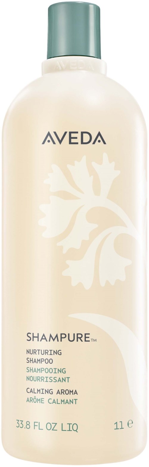 Aveda nährendes beruhigendes Aroma-Shampoo-Flasche mit grünem Verschluss und weißen Blumenmuster.