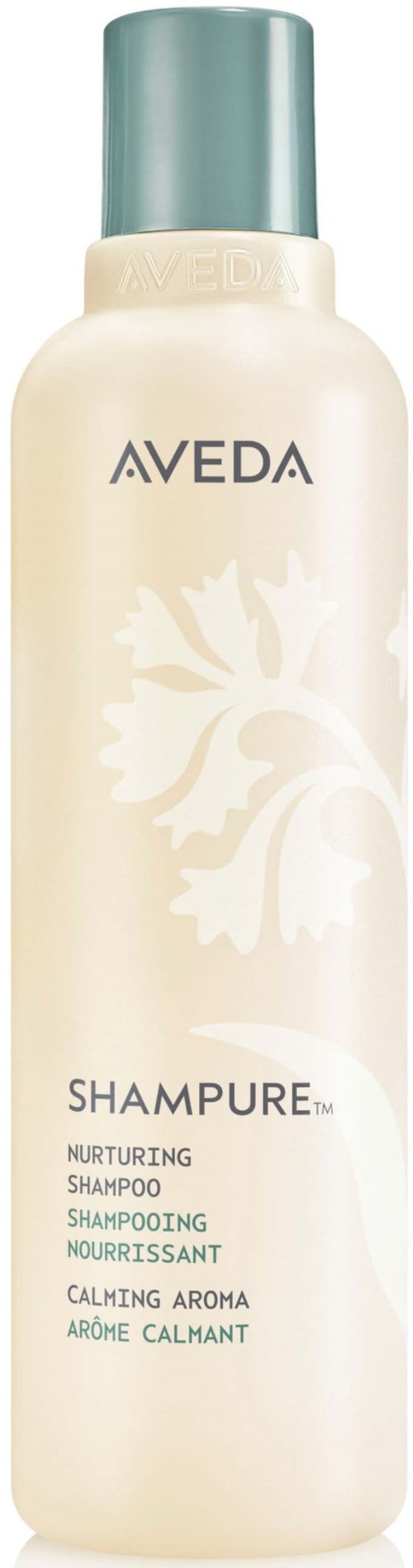 Eine Flasche Aveda-Shampoo mit grauem Verschluss, weißem Körper und grünem Blattmuster auf dem Etikett.