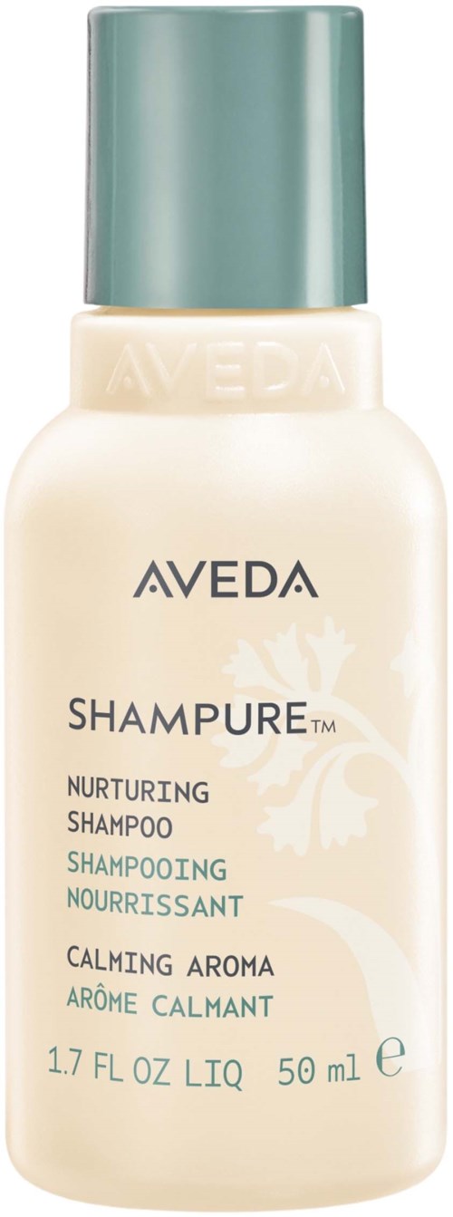 Eine kleine Flasche Aveda-Shampoo mit grünem Deckel und weißem Etikett mit Produktdetails.