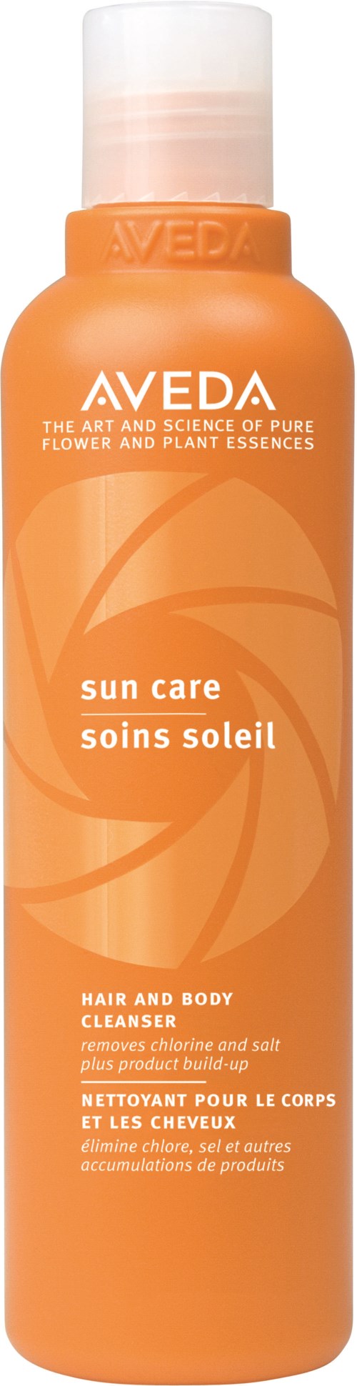 Orange bottle of AVEDA sun care with a white cap, labeled as a hair and body cleanser.