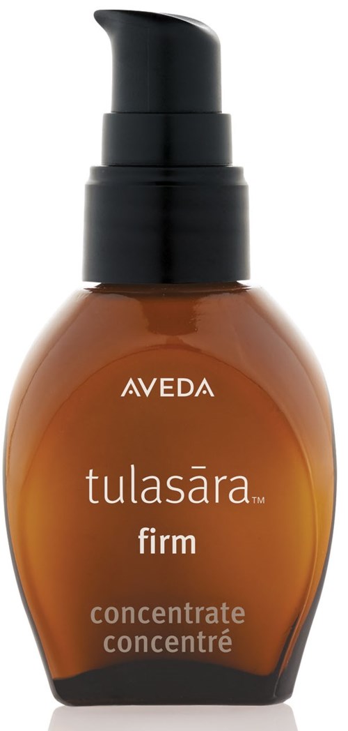 Eine braune Flasche mit schwarzen Pump, beschriftet Aveda Tulasara Firm concentrate, für Hautpflege.