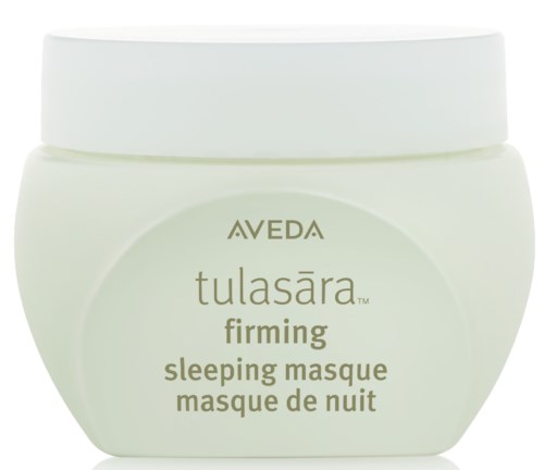 A light green jar of Aveda Tulasara firming sleeping masque. White lid, simple label design, text in English and French.