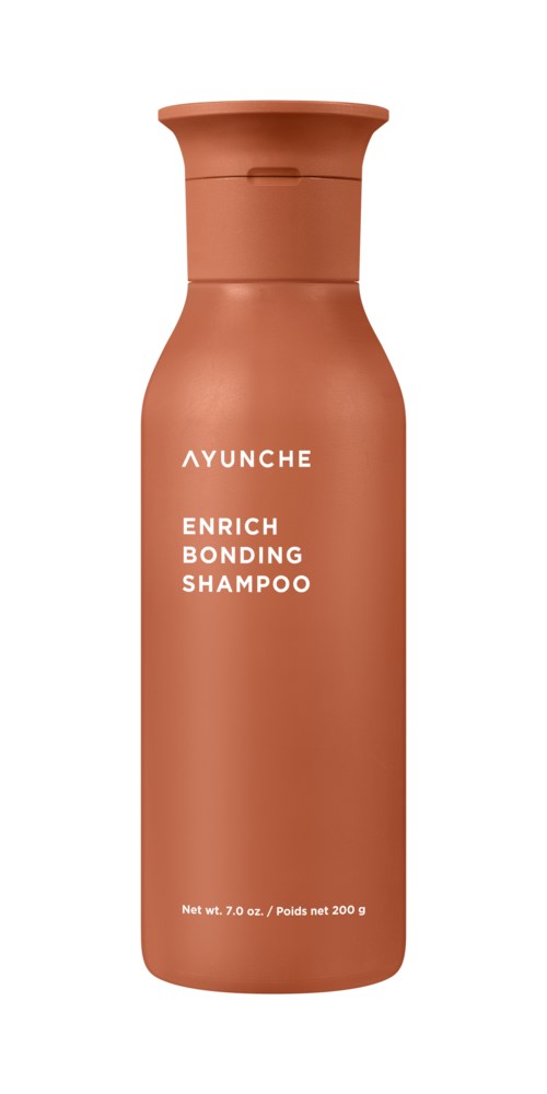 A tall, brown bottle with a narrow neck labeled 'AYUNCHE ENRICH BONDING SHAMPOO' in white text.