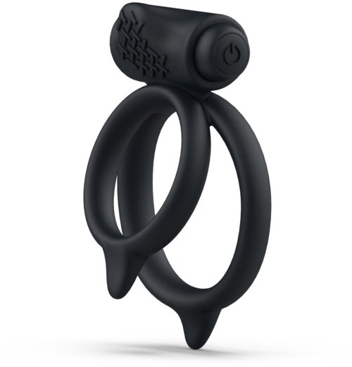 Ein schwarzes Gerät in Ringform mit einem kleinen, strukturierten, runden oberen Teil und einem Netzschalter.