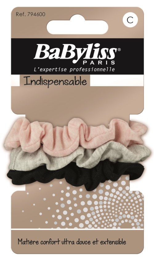 Four fabric scrunchies in pink, gray, beige, and black on brand packaging.