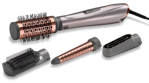 A hair styling tool with attachments, including a round brush and other accessories, for hair drying and styling.