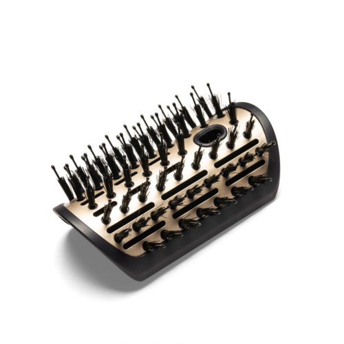 A black and beige tool with multiple small metal pins and a hole, used for cleaning or removing dirt from small objects.