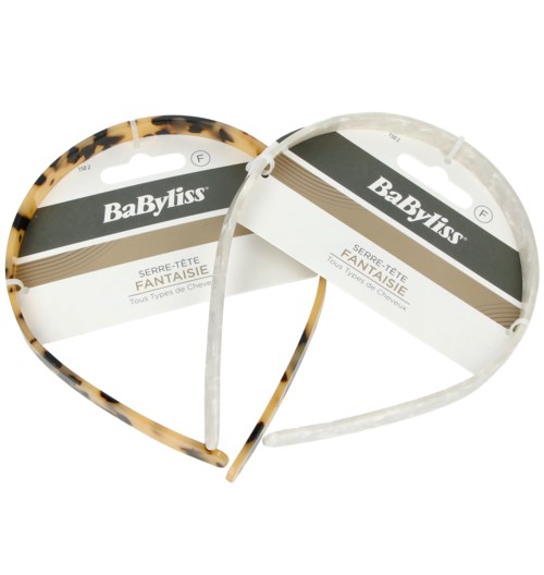 Two plastic headbands, one with a leopard pattern and one clear, are displayed with packaging labels.