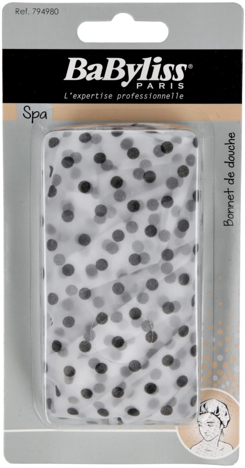 A polka dot shower cap in clear plastic with black and gray dots, in packaging marked 'BaByliss Paris' for spa use.