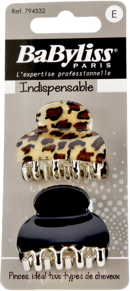 A package shows a hair clip with a leopard print design, four smaller clips underneath, and text in French.
