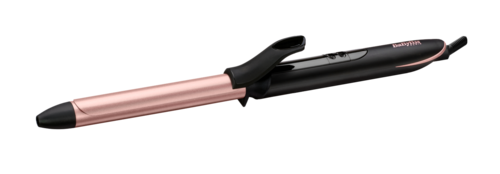 A hair curling iron with a pink and black design, featuring a clamp and a cord.
