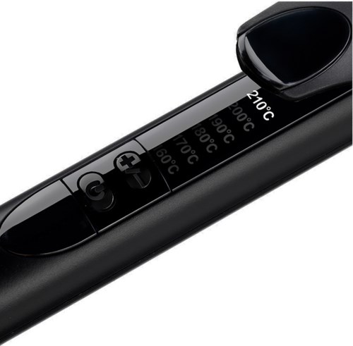 A black electronic device with buttons and a screen showing temperatures, used for cooking or food preparation.