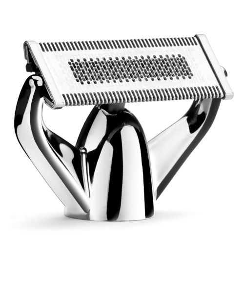 A shiny, modern safety razor with a metal handle and a broad blade head.