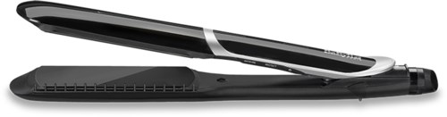 The image shows a modern flat iron hair straightener on a black background.