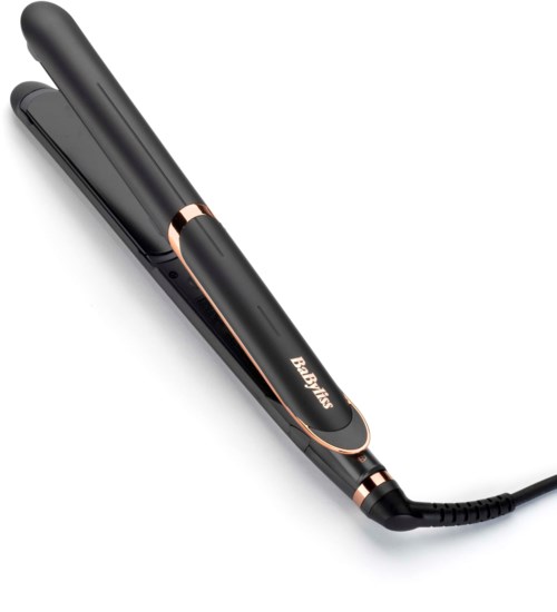 A black hair straightener with rose gold accents and a power cord.