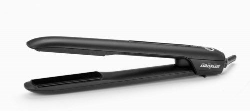 A black hair straightener with a closed clamp and brand name on the handle.