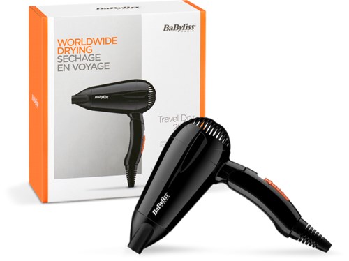 Black travel hair dryer with orange accents, in front of its orange and white box, labeled 'World Wide Drying' by BaByliss.