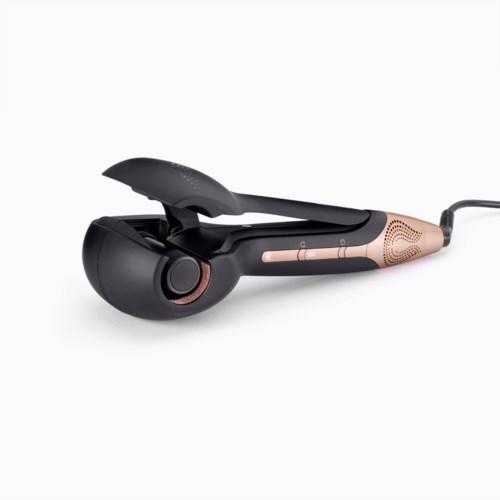 A hair straightener is shown, with a black and rose gold design and a clamp for styling hair.