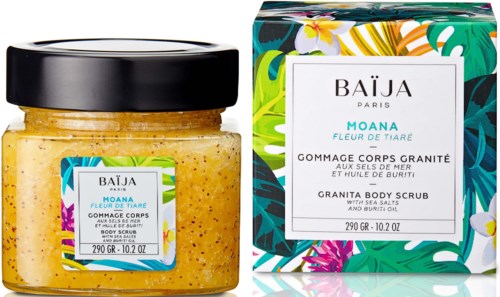 A jar of yellow body scrub and colorful packaging box with tropical leaf designs. Both are labeled BAÏJA Moana.