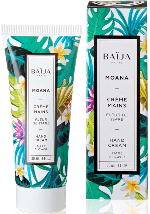 A tube and box of Moana hand cream with a tropical floral design and green and blue leaves.