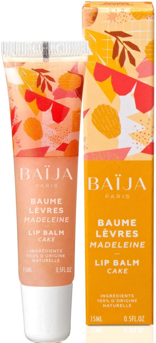 Lip balm in a pink tube with colorful abstract design and a matching box with yellow and pink patterns.