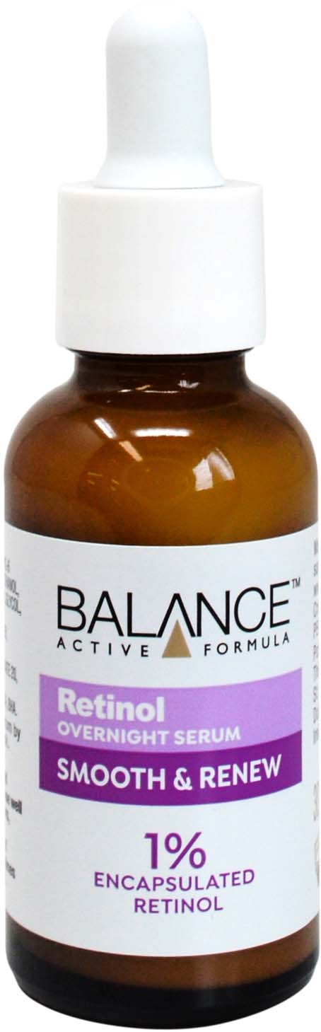 Eine kleine braune Flasche mit weißem Tropfer enthält Retinol-Serum für Hauterneuerung.