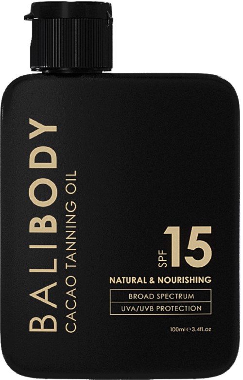 Een zwarte fles met zelfbruider olie met SPF 15, natuurlijke ingrediënten, breed spectrum bescherming, 100 ml.