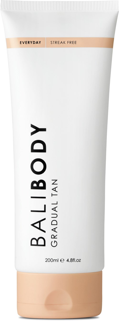 Een witte tube met beige dop, gelabeld 'Gradual Tan' en 'Everyday Streak Free'.