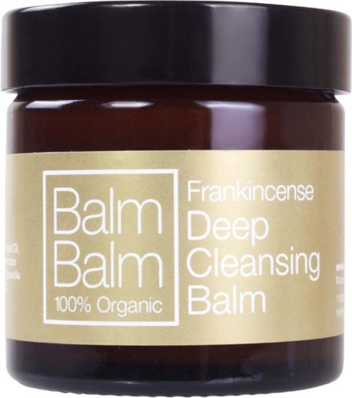 Een pot met diepe reinigingsbalsem, beige label, zwarte deksel en tekst over biologisch en aromatisch.