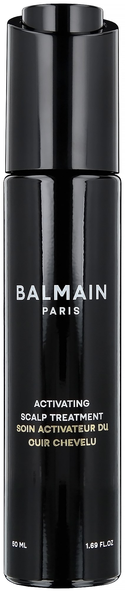 En svart flaska med vit text, märkt 'BALMAIN PARIS' och 'ACTIVATING SCALP TREATMENT'.
