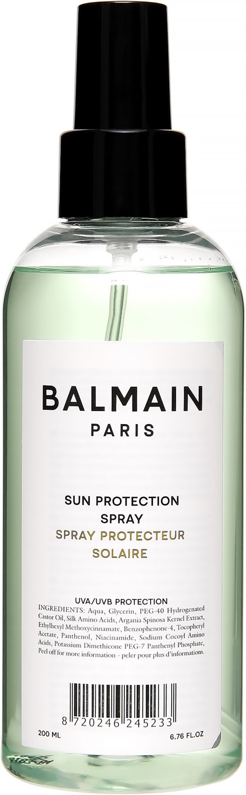 En klar sprayflaska märkt 'Balmain Paris Sun Protection Spray' med ett svart lock.