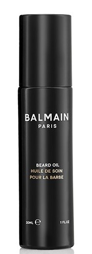 Musta pullo, jossa lukee 'Balmain Paris Beard Oil', tarkoitettu parran hoitoon.