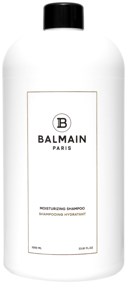 Valkoinen pullo mustalla korkilla, etiketti sanoo Balmain Paris, kosteuttava shampoo, 1000 ml.