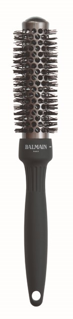 A round hairbrush with black handle and metal bristles, branded with 'BALMAIN'.