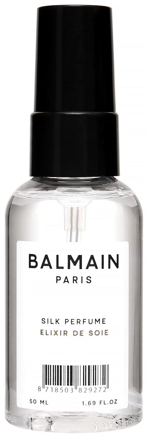 A small clear bottle with a black spray cap, labeled 'Balmain Paris' and 'Silk Perfume Elixir de Soie'.