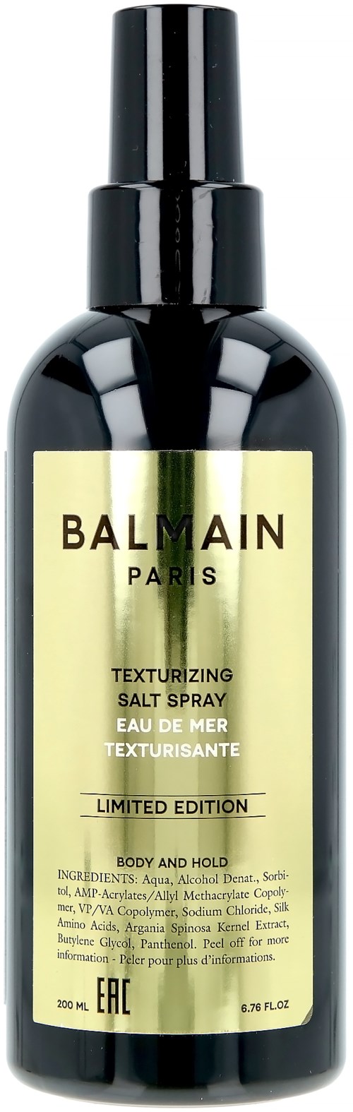 En svart flaska med spraylock, märkt 'Balmain Paris Texturezing Salt Spray', begränsad utgåva för kropp och stadga.