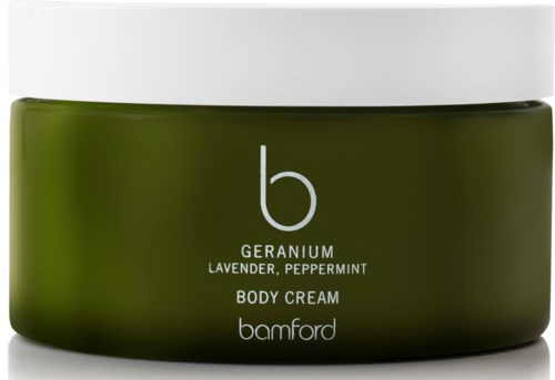 Ein grüner Behälter mit Bamford Geranie Lavendel Pfefferminz Körpercreme mit weißem Deckel.