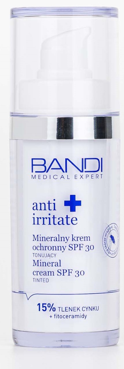 A white and blue bottle of mineral cream for irritated skin with SPF 30, marked with a blue cross and branding.