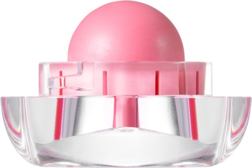 En rosa rund gjenstand i en klar glassbeholder med en rosa skuff under.